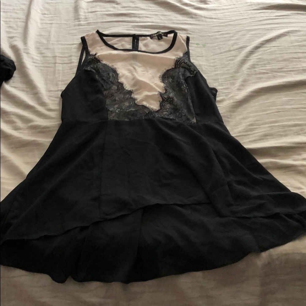 Sheer cream and black lace blouse